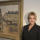 Carmen Thyssen, junto al cuadro de Camile Pissarro 'Rue Saint-Honoré por la tarde. Efecto de lluvia.-EFE / ALEJANDRO GARCIA