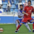 David Rodríguez, en una acción de juego durante el partido del pasado domingo en Tenerife.-ÁREA 11