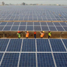 Placas solares en edificios.-AFP/ NARINDER NANU