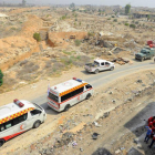 Convoy de evacuación de Daraya.-OMAR SANADIKI / REUTERS