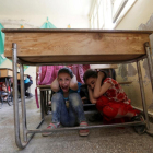 Niños sirios de una localidad de la provincia de idlib durante un simulacro.-REUTERS / KHALIL ASHAWI