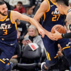 Ricky Rubio ante Danny Green, en el encuentro entre los Spurs y los Jazz.-EFE / D WILLIAM ABATE