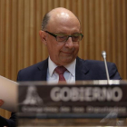 El ministro de Hacienda, Cristóbal Montoro, durante su comparencia en la Comisión de Hacienda del Congreso de los Diputados.-DAVID CASTRO
