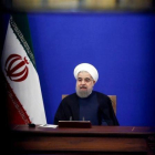 El presidente iraní, Hasán Rohaní, durante la entrevista televisiva tras la implementación de nuevas sanciones.-ATTA KENARE (AFP)