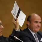El secretario general de la OCDE, Ángel Gurría, y el ministro de Economía en funciones, Luis de Guindos, en una imagen de archivo.-JOSÉ LUIS ROCA