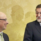 Montoro y Rajoy.-ARCHIVO / EFE