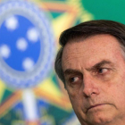BRASILIA  BRASIL  - El presidente electo de Brasil  Jair Bolsonaro y el actual mandatario  Michel Temer  fuera de cuadro  ofrecen una declaracion conjunta en el Palacio del Planalto  sede del Gobierno.-EFE