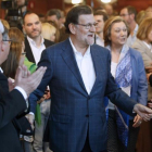 El líder del PP, Mariano Rajoy, en una convención sobre educación de su partido este sábado en Zaragoza.-EFE / JAVIER BELVER