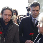 Iglesias y Sánchez, con la alcaldesa de Madrid, Manuela Carmena, durante el reciente homenaje a las víctimas del 11-M.-EFE / PACO CAMPOS