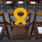Lazo amarillo en solidaridad con Oriol Junqueras en un mitin de ERC-DANNY CAMINAL