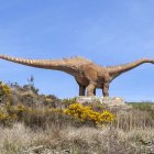 Maqueta de un dinosaurio en Tierras Altas