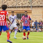 David Sanz en el primer partido de pretemporada del Numancia ante el Atlético de Madrid, en la imagen con el colchonero Koke.
