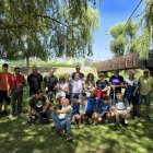 Foto de familia de los participantes y la organización.