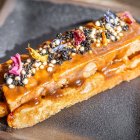 El “Gofre micológico” del Hotel Alfonso combina una base crujiente con una mezcla de setas y una presentación que imita a un postre gourmet.