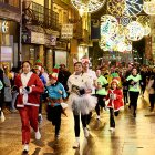 Colorido y diversión en las calles de Soria con motivo de la Carrera de Navidad.