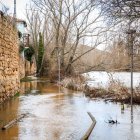 Río Duero desbordado a su paso por la ciudad de Soria.