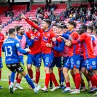 Éxtasis entre los jugadores del Numancia tras el gol de Carlos Gutiérrez que daba el triunfo ante el Real Ávila.