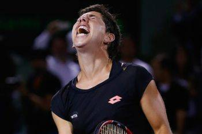 Carla Suárez, eufórica tras batir a Venus Williams en cuartos de final del torneo de Miami.-Foto: AFP / AL BELLO
