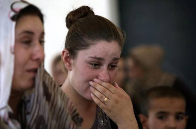 Una joven yazidí, comunidad considerada hereje por el Estado Islámico.-