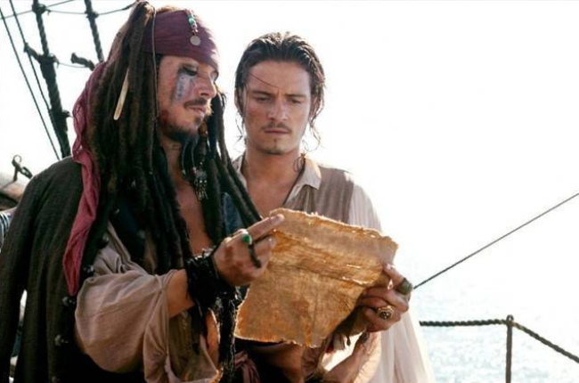 Johnny Depp y Orlando Bloom protagonizan  la segunda entrega de 'Piratas del caribe' .-