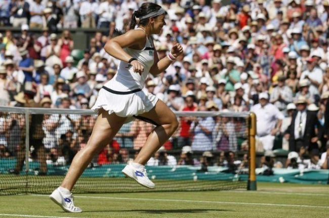 Marion Bartoli, en el torneo de Wimbledon que conquistó en julio del 2013.-STEFAN WERMUTH
