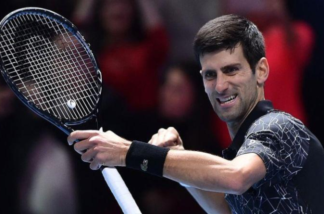 Novak Djokovic celebra uno de sus puntos ganadores en Londres.-AFP / GLYN KIRK