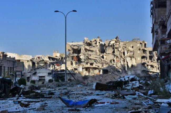 Edificios destruidos por los bombardeos en el barrio de Bustan al-Basha de Alepo, Síria.-AFP / GEORGE OURFALIAN