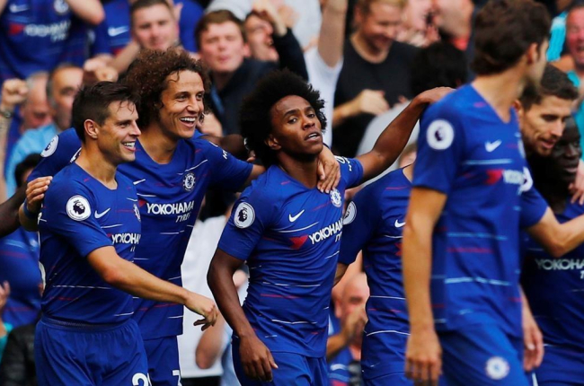 Las estrellas del Chelsea celebran un gol en partido de la Premier en Stamford Bridge.-EDDIE KEOGH