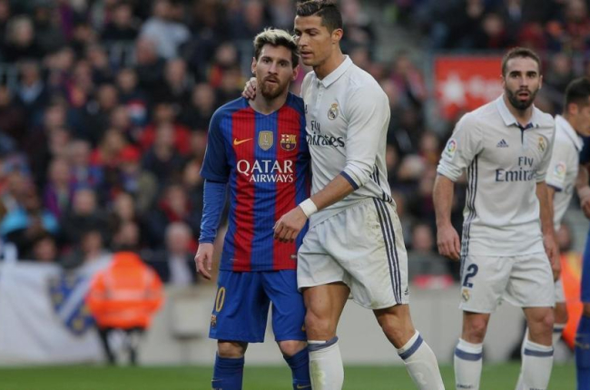Messi y Cristiano Ronaldo, en diciembre del año pasado.-MARC CASANOVAS