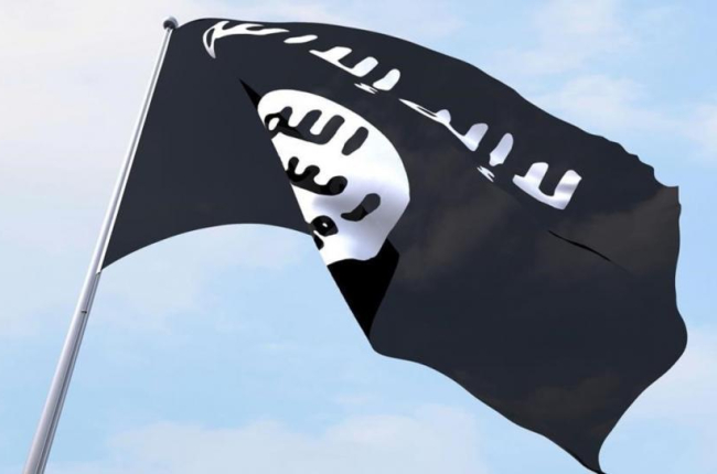 Una bandera del Estado Islámico ondeando.-