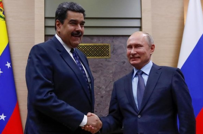 Encuentro de Putin y Nicolás Maduro, el pasado diciembre, en Moscú.-MAXIM SHEMETOV (REUTERS)