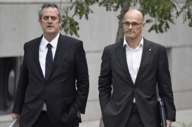 Joaquim Forn y Raül Romeva se dirigen a declarar ante la Audiencia Nacional, en una foto de archivo.-EL PERIÓDICO