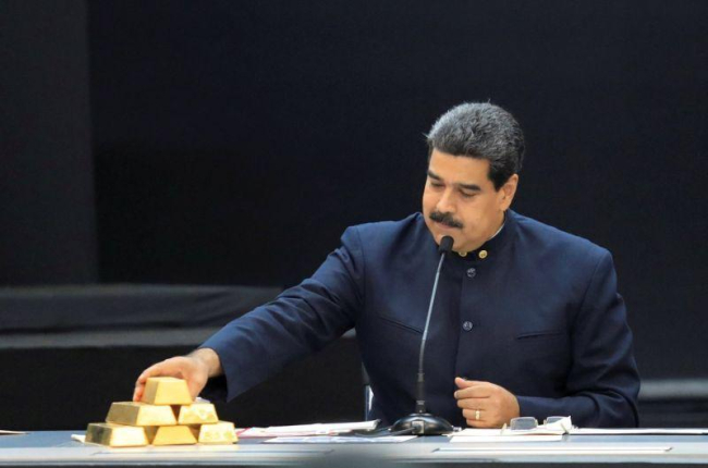 Nicolas Maduro tiene que recurrir a las reservas de oro para tener ingresos tras las sanciones de EEUU.-MARCO BELLO / REUTERS