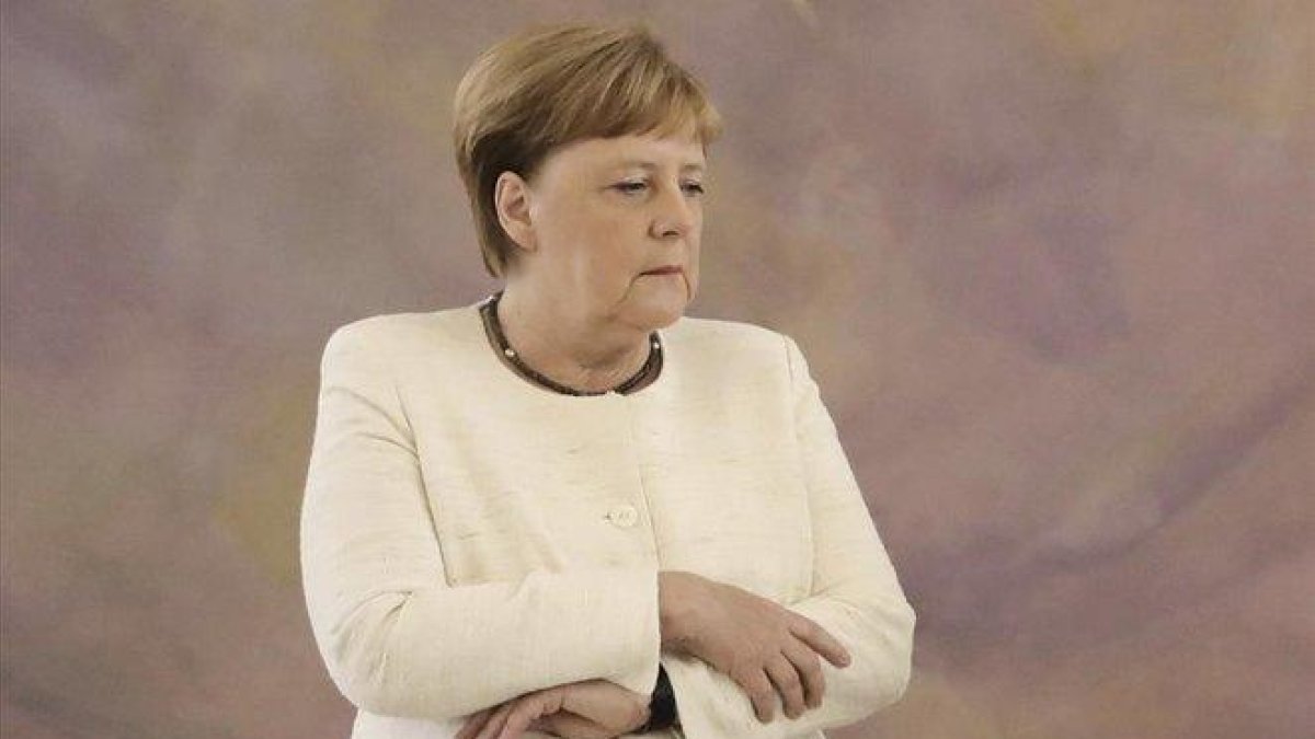 La cancillera alemana, Angela Merkel,  en el acto celebrado en el palacio de Bellevue (Berlín).-KAY NIETFELD (DPA)