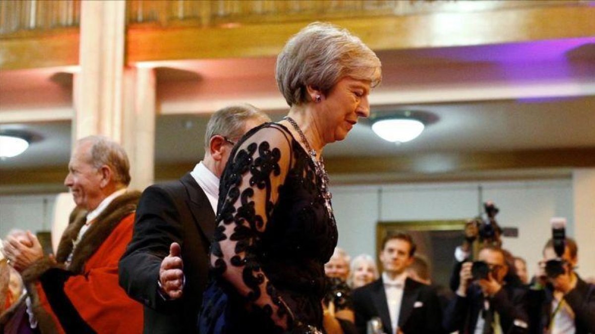 Theresa May en un banquete el lunes en Londres.-REUTERS / HENRY NICHOLLS
