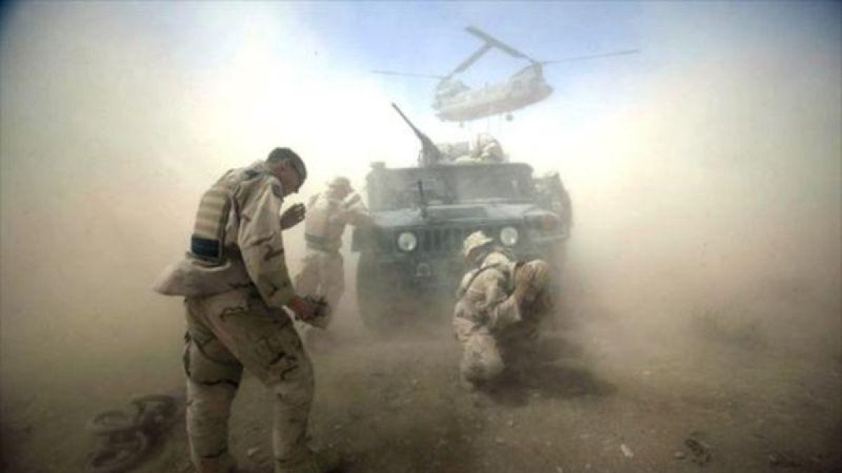 Soldados americanos en Afganistán, durante una operación realizada en el 2004.-AP / DAVID P. GILKEY
