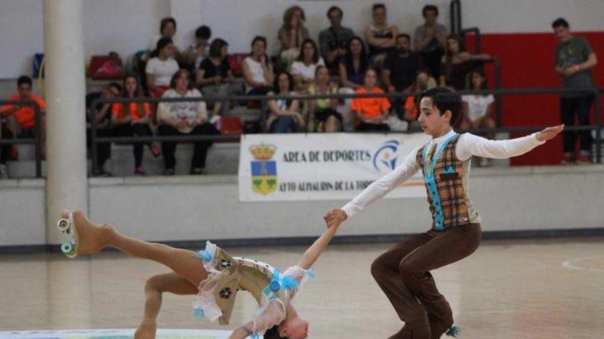 Héctor Díez en el ejercicio del Nacional junto a su compañera India González.-HDS