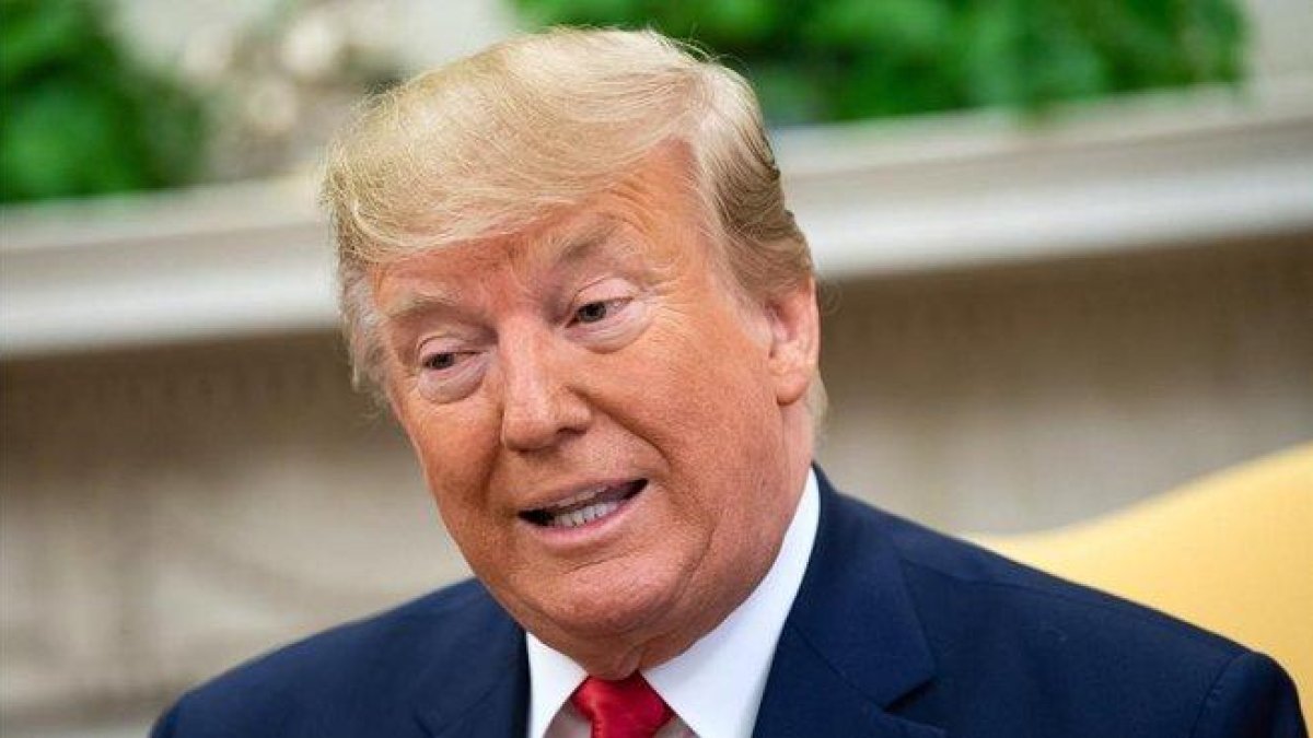 Donald Trump responde preguntas en la Casa Blanca.-KEVIN DIETSCH (EFE/EPA POOL)