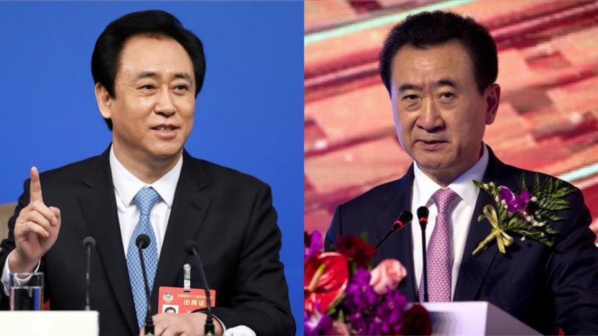 A la izquierda Xu Jiayin, dueño de Evergrande y a la derecha Wang Jianlin, propietario de Wanda.-AGENCIAS