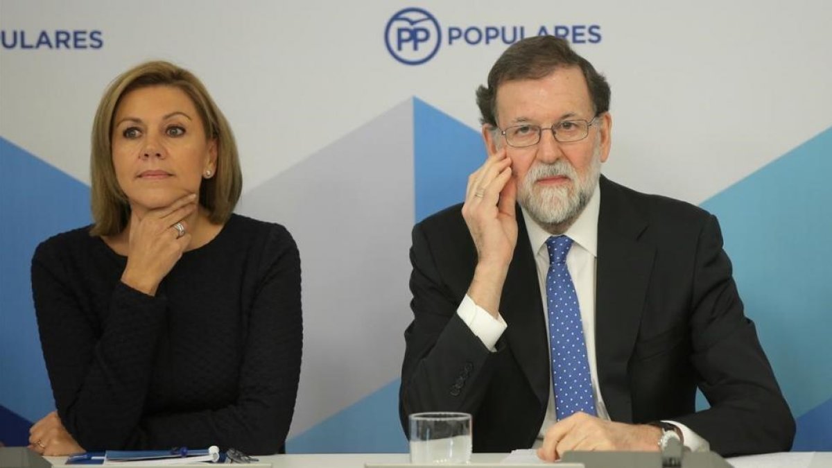 María Dolores de Cospedal junto a Mariano Rajoy durante el comité ejecutivo nacional del PP.-JOSÉ LUIS ROCA