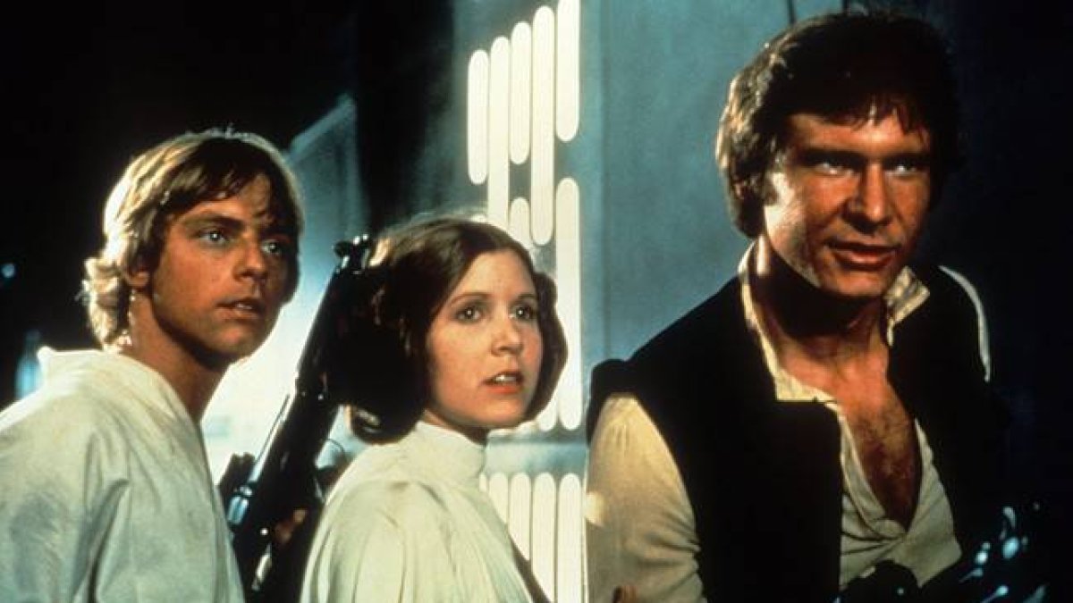 Han Solo (Harrison Ford) junto a los personajes de Leia y Luke Skywalwer, en la primera trilogía de 'La guerra de las galaxias'.-
