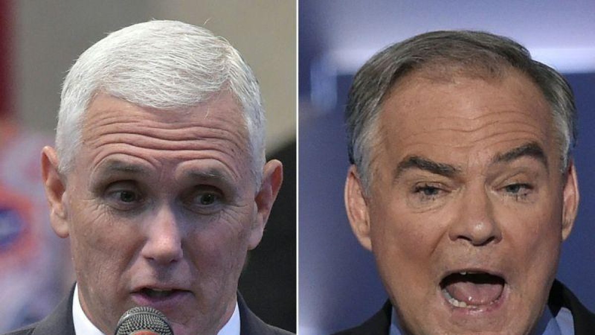A la izquierda, Mike Pence, candidato a vicepresidente de Trump. Tim Kaine, el candidato de Clinton, a la derecha.-MANDEL NGAN / SAUL LOEB / AFP