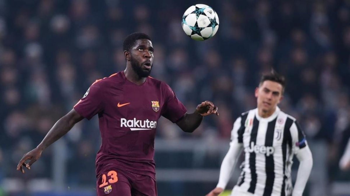 Umtiti, frente a la Juventus.-AFP / FILIPPO MONTEFORTE