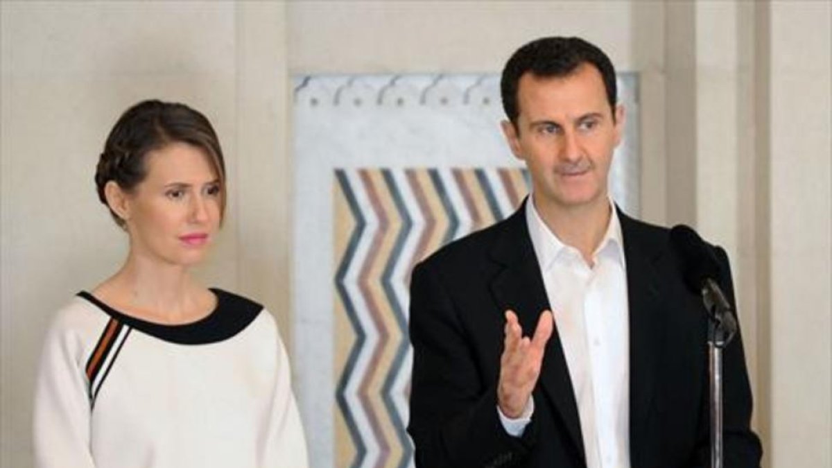 Asma y Bashar el Asad, en un acto en Damasco, en marzo.-ARCHIVO / AFP