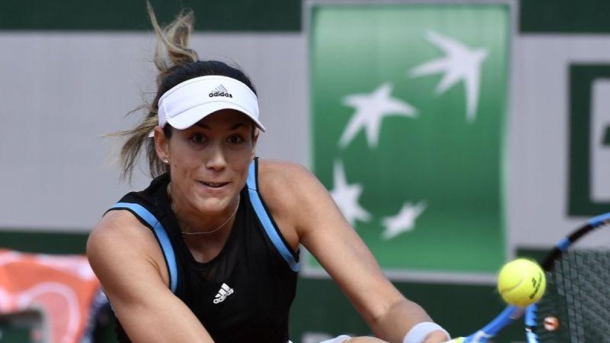 Garbiñe Muguruza.-