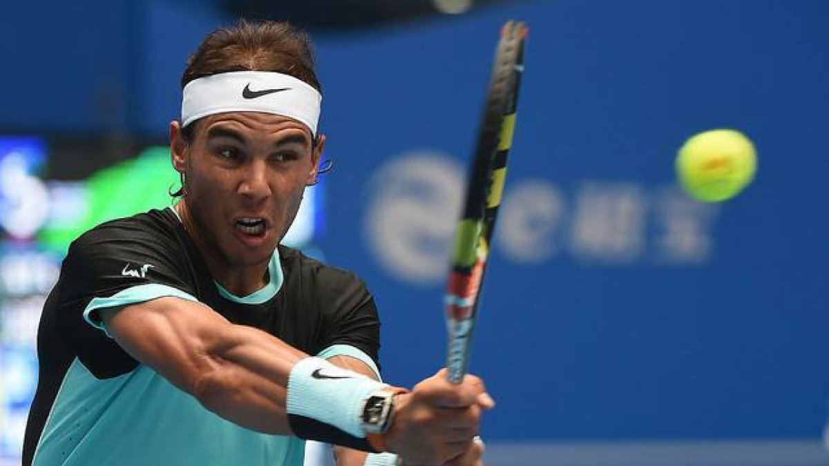 Rafael Nadal, durante el partido contra Wu Di, su debut en el Abierto de China.-AFP / GOH CHAI HIN