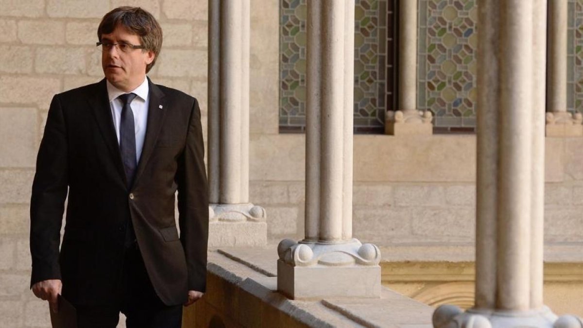 Carles Puigdemont tras su comparecencia.-AFP / JOSEP LAGO