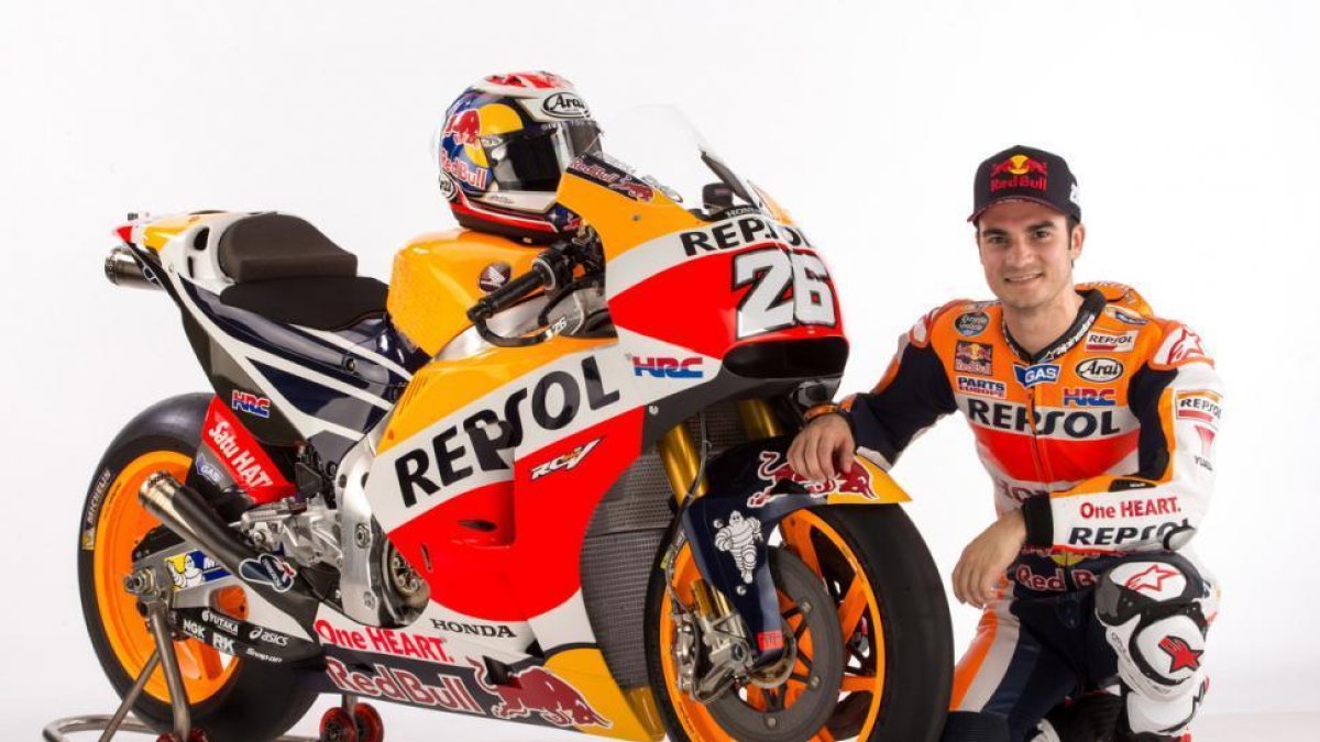Dani Pedrosa, junto a su Honda RC213V de este año.-REPSOL-HONDA MEDIA