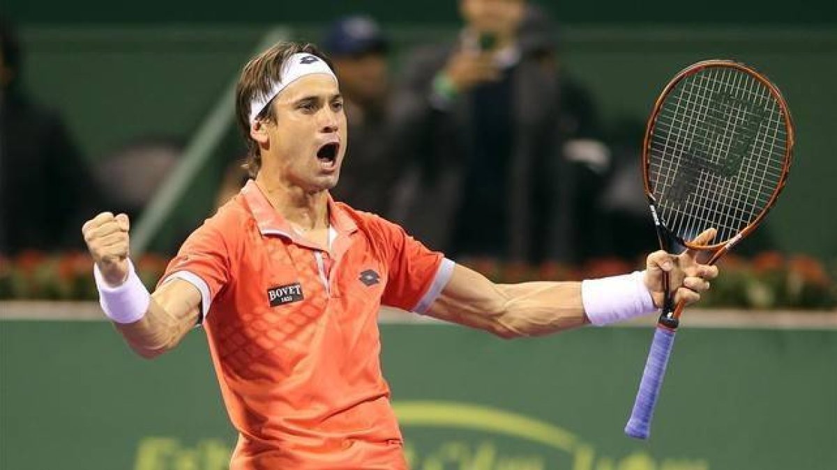 Ferrer celebra el pase a la final de Doha tras derrotar a Karlovic.-Foto: AFP / KARIM JAAFAR
