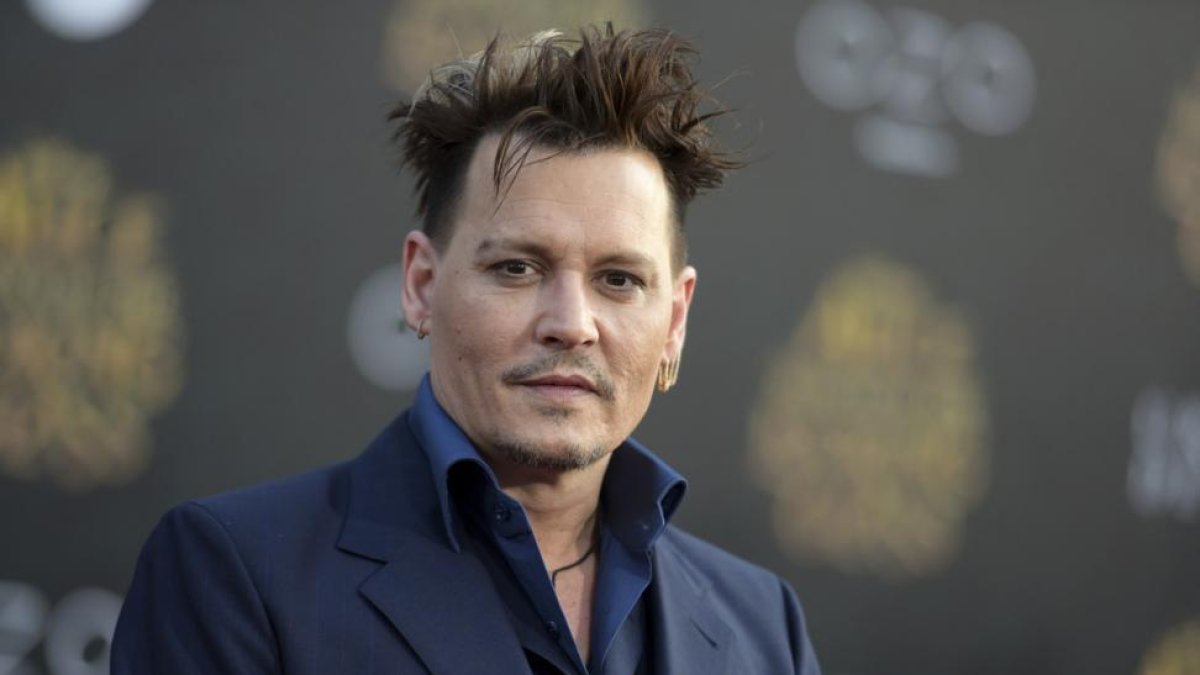 Johnny Depp, denunciado por su antiguo bufete de abogados.-AP